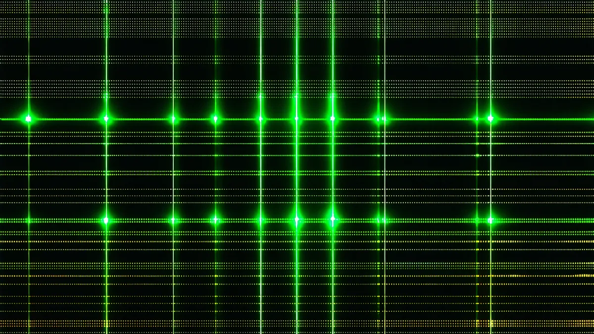 Visual representation of compliance gap detection — amber signal against dark monitoring surface